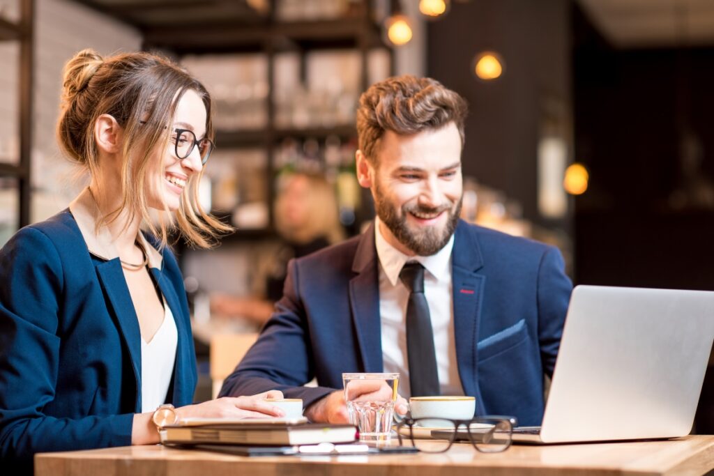 Young interim finance professionals working in a table