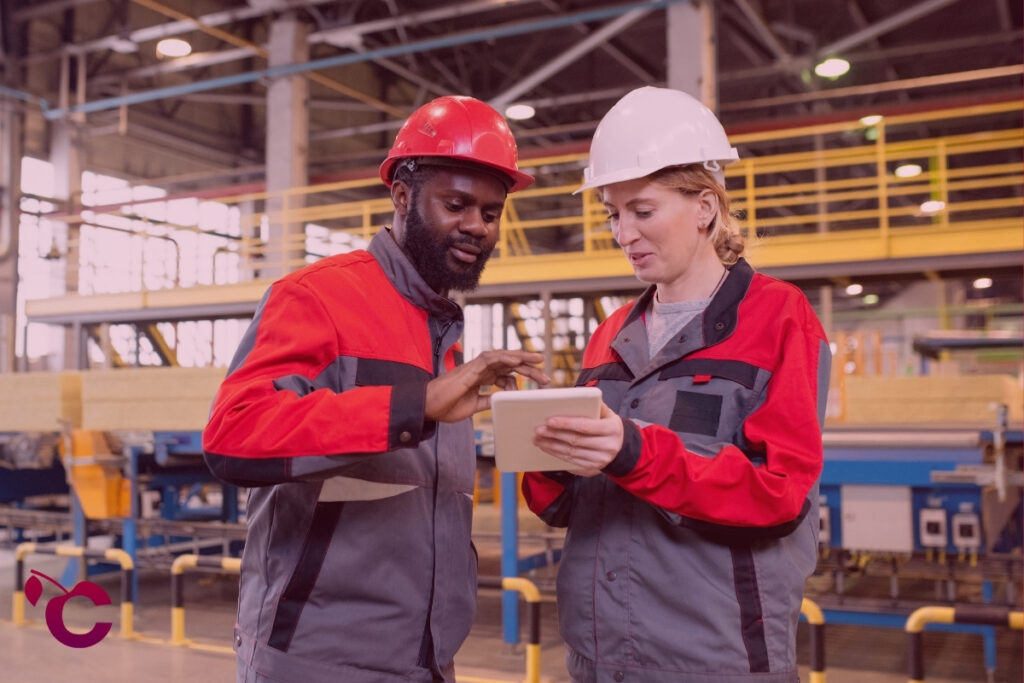 Engineering team working at manufacturing plant and discussing their skillsets